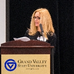 Lisa Perhamus presenting at Symposium